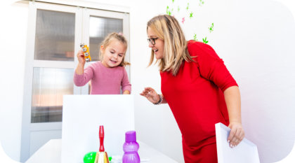 a female kid with an adult woman