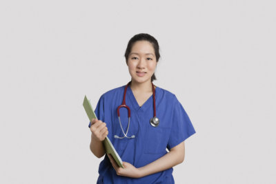 nurse holding a clip board