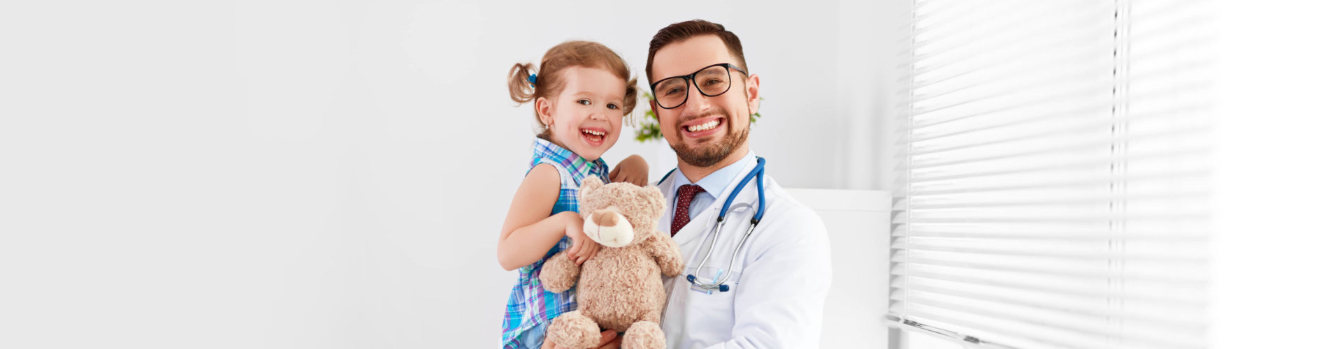 a female kid with a male doctor