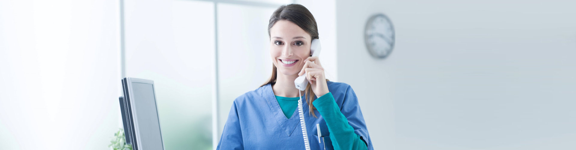 a nurse on a telephone