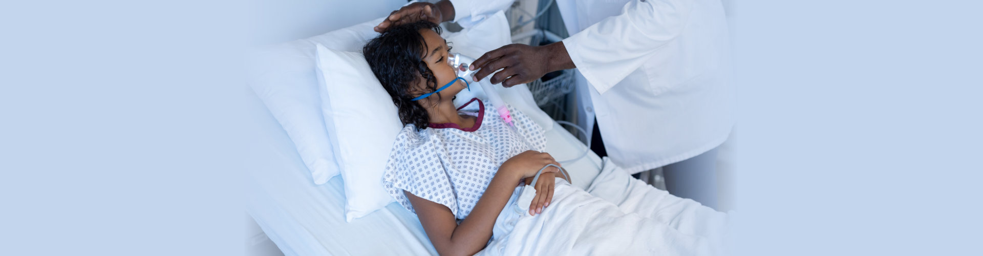 Midsection of male doctor putting oxygen mask ventilator on sick